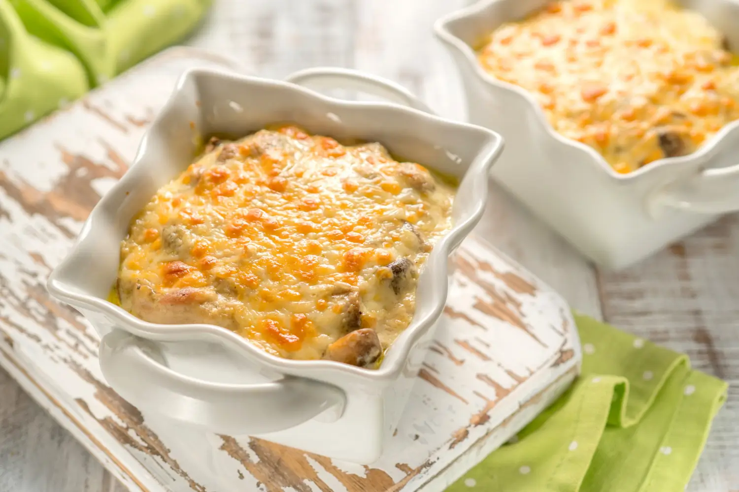 Chicken and dressing recipe served in a casserole dish