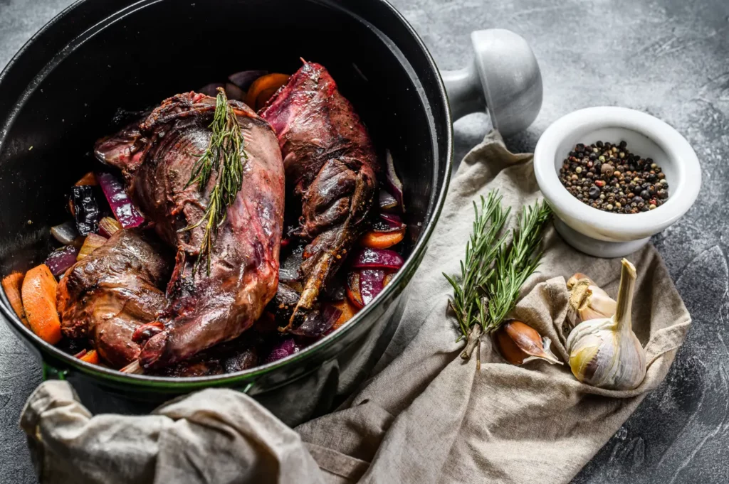 Perfectly plated venison roast with roasted vegetables.