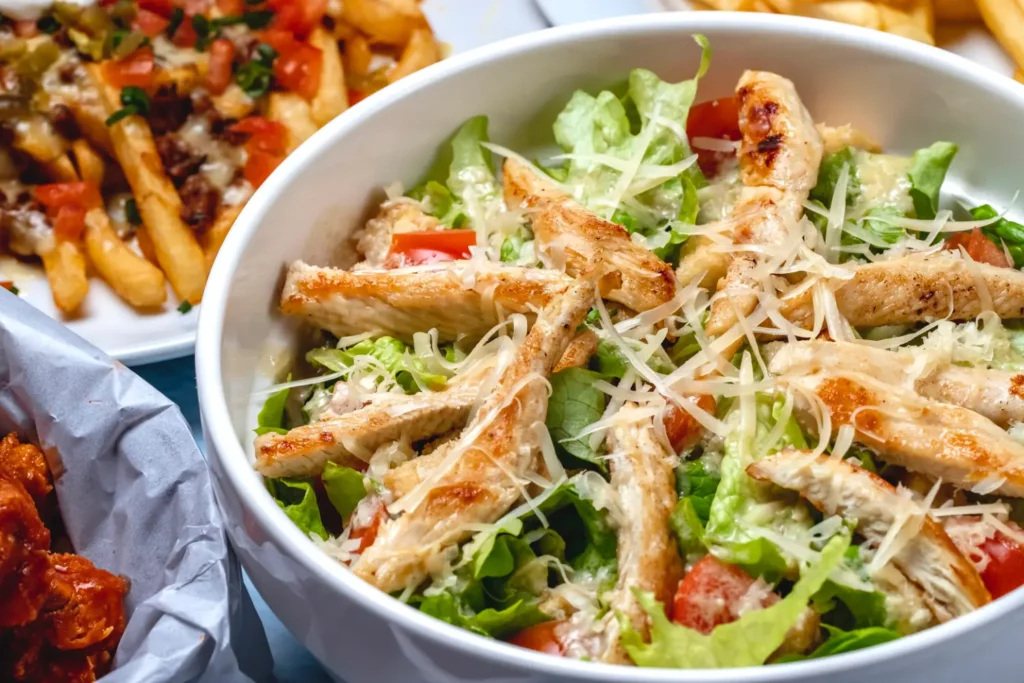 Vibrant burger bowl with fresh ingredients and creamy sauce