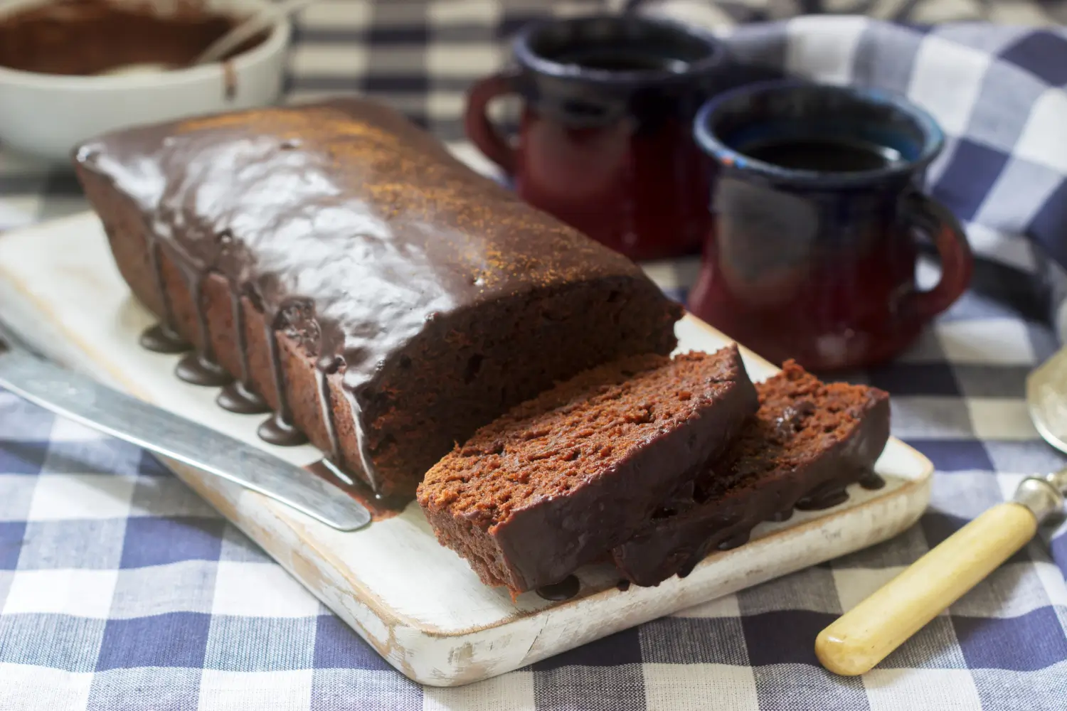 Part 8: Frequently Asked Questions (FAQs) (200 Words) Why Did My Chocolate Pound Cake Turn Out Dry? There are a few reasons why your chocolate pound cake recipe might come out dry. Overbaking is the most common culprit—be sure to check the cake 5-10 minutes before the suggested time with a toothpick. If it comes out clean or with a few moist crumbs, it’s ready! Using too much flour or not enough butter or liquid can also result in a dry texture. For consistent results, always measure your ingredients accurately and use room-temperature butter and eggs to improve mixing. What is the Best Way to Ensure an Even Crumb Texture? To get that perfect, even crumb, take your time when creaming the butter and sugar—it should look pale and fluffy, not gritty. Also, be sure to add eggs one at a time to avoid breaking the emulsion. Finally, avoid overmixing when adding dry ingredients. Instead, fold them in gently until just combined to prevent a dense cake. Can I Make a Gluten-Free Version of Chocolate Pound Cake? Yes, you can! Simply swap out the all-purpose flour for a high-quality gluten-free flour blend. Many blends include xanthan gum, which helps mimic the structure that gluten provides. You can also experiment with almond flour for added richness, but note that it may make the cake slightly denser. Part 9: Conclusion and Final Thoughts (200 Words) Key Takeaways for Baking the Perfect Chocolate Pound Cake Baking the perfect chocolate pound cake recipe is all about using the right ingredients, following each step with care, and avoiding common pitfalls like overmixing and incorrect oven temperatures. A few small adjustments—like adding sour cream or swapping in espresso powder—can make a big difference in flavor and texture. Encouragement to Try New Customizations One of the joys of baking is making a recipe your own. Whether you top your cake with a glossy chocolate ganache, add orange zest for a citrus twist, or serve it with a scoop of ice cream, there are endless ways to elevate this classic dessert. Don’t be afraid to experiment—you might just create a new family favorite! With its rich, buttery texture and deep chocolate flavor, this cake is sure to be a hit at any gathering. Now that you’ve mastered this chocolate pound cake, why not try a twist on another classic dessert? For more inspiration, check out our brookie recipe—a brownie-cookie hybrid that’s just as delicious! Let me know if you’d like to see any revisions or additional content!