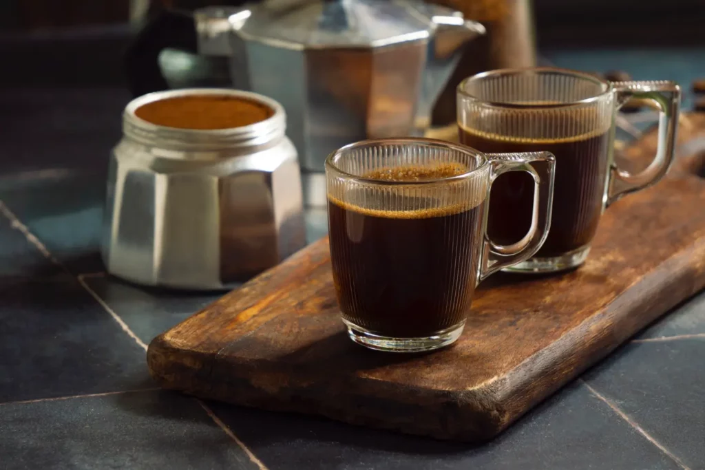 Authentic Cuban Coffee in a Demitasse Cup with Moka Pot