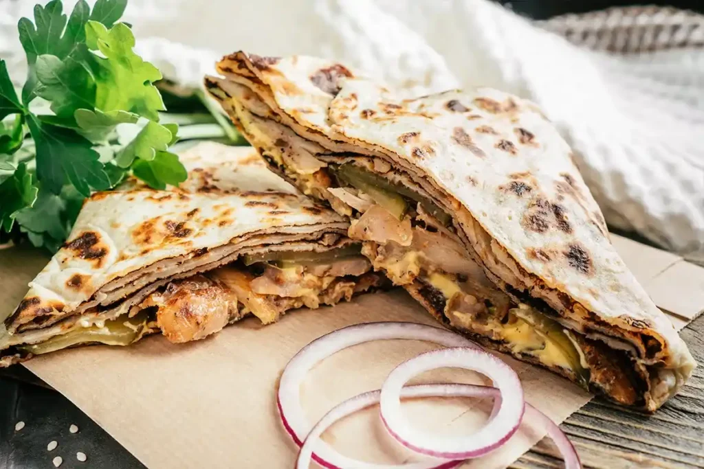 “Crispy chicken quesadillas with shredded rotisserie chicken and melted cheese