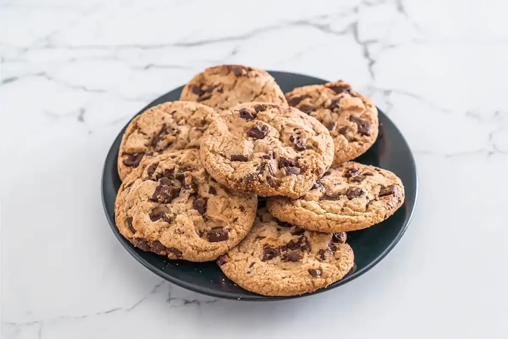 Small batch chocolate chip cookies served with a glass of milk